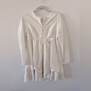 White cotton dress with lace layers